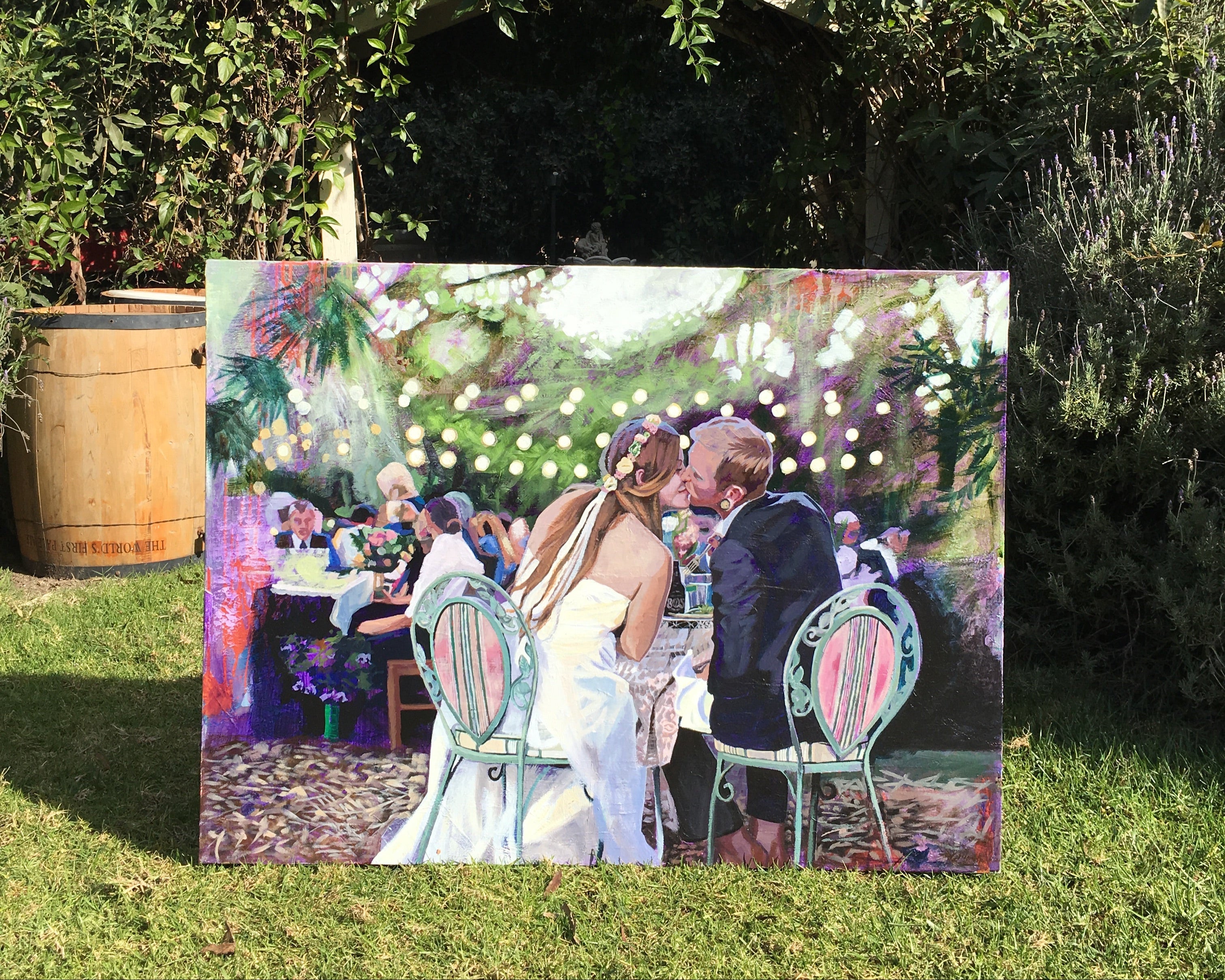 Jamie Wells creating a custom wedding painting during the reception."
"Live art painting of a couple’s first dance by Jamie Wells.